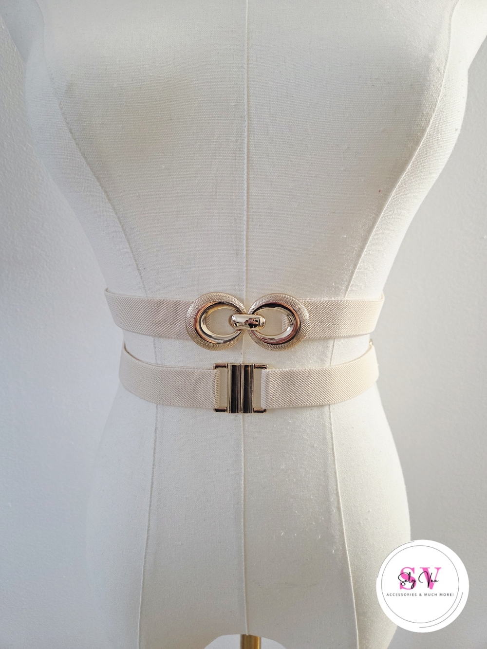 Bundle of 2 elastic beige belts with gold buckle